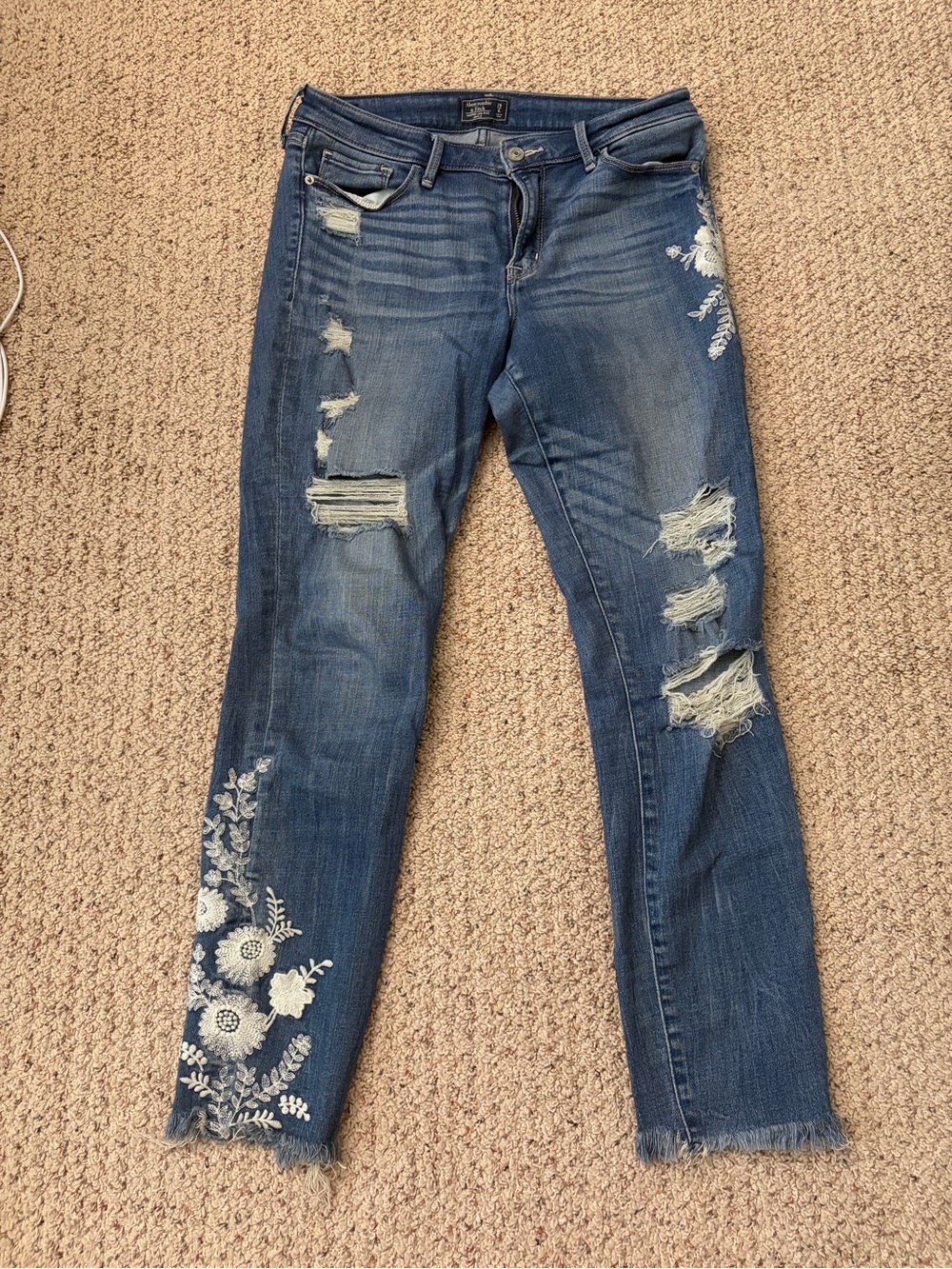 Abercrombie & Fitch Distressed Blue Skinny Jeans with White Floral Embroidery